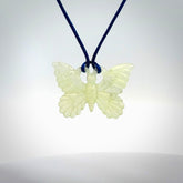 Hand carved Prehnite Crystal butterfly Pendant. Made by NZ Pacific and for sale online. Exotic, Hand made butterfly Jewellery.